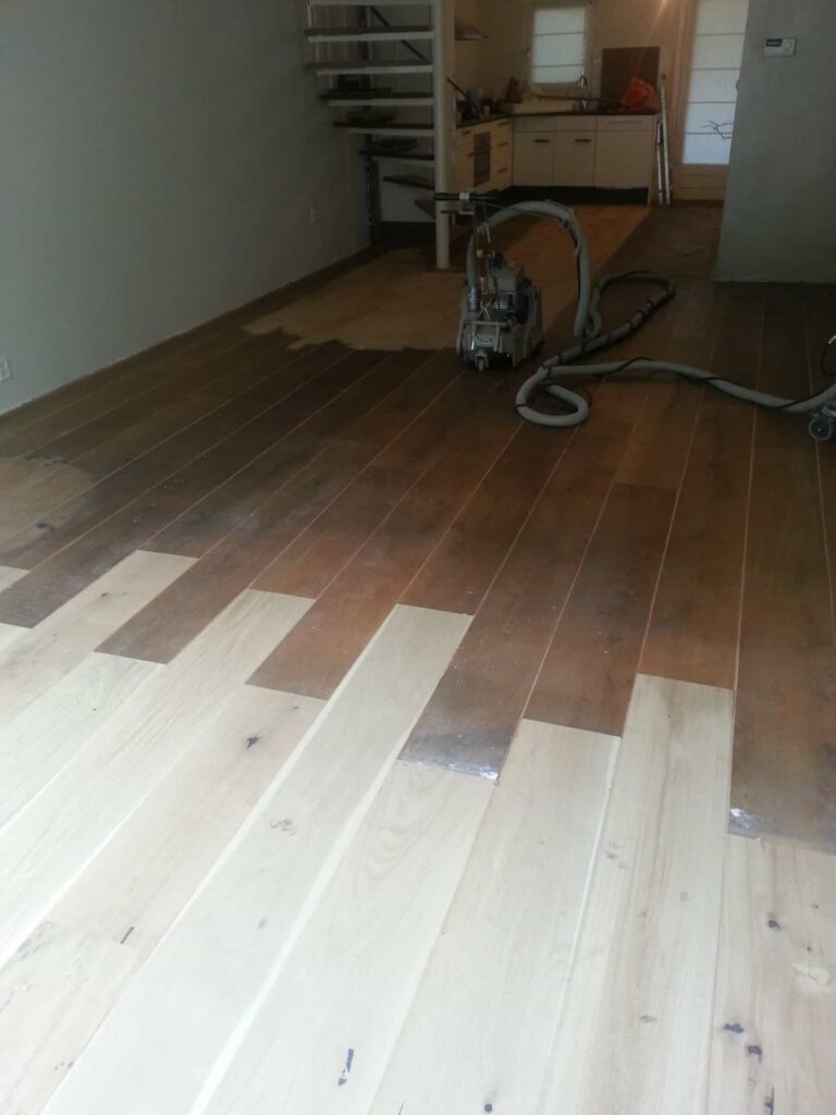 Aanhelen van beschadigd parket